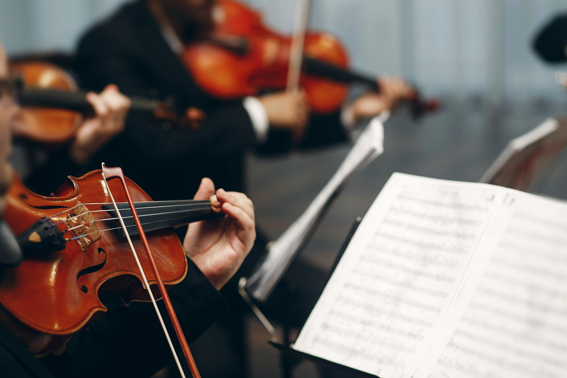 Elegant String Quartet Performing at Wedding Reception in Restau